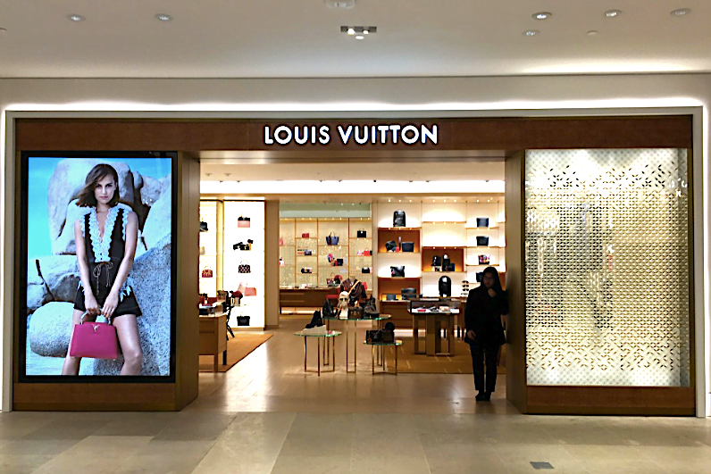 A Louis Vuitton store on the ground floor of the building housing