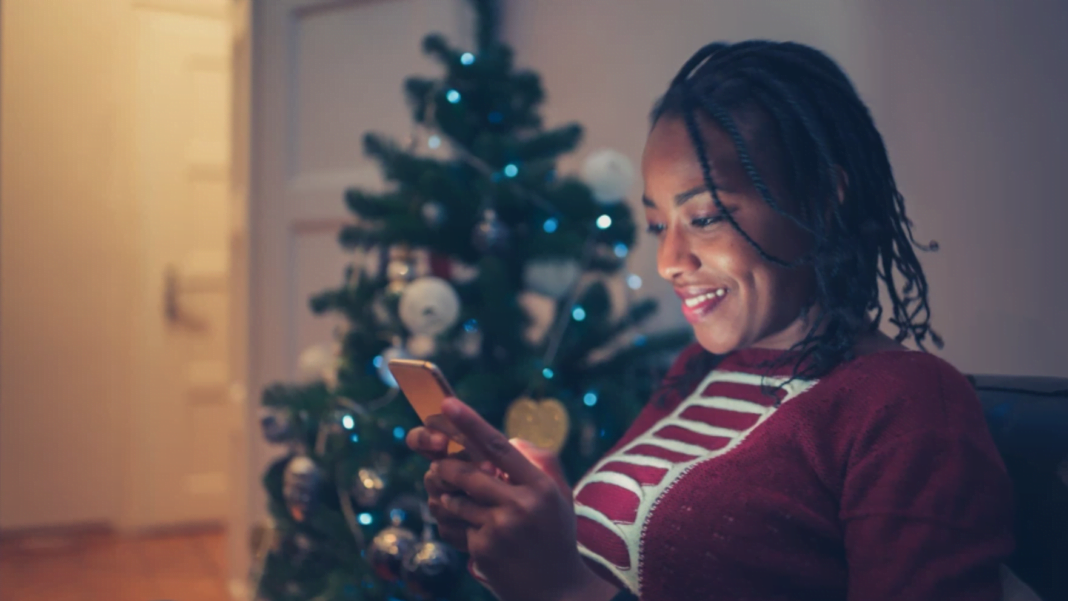 Woman shops online during the holiday period. Photo: Salesforce