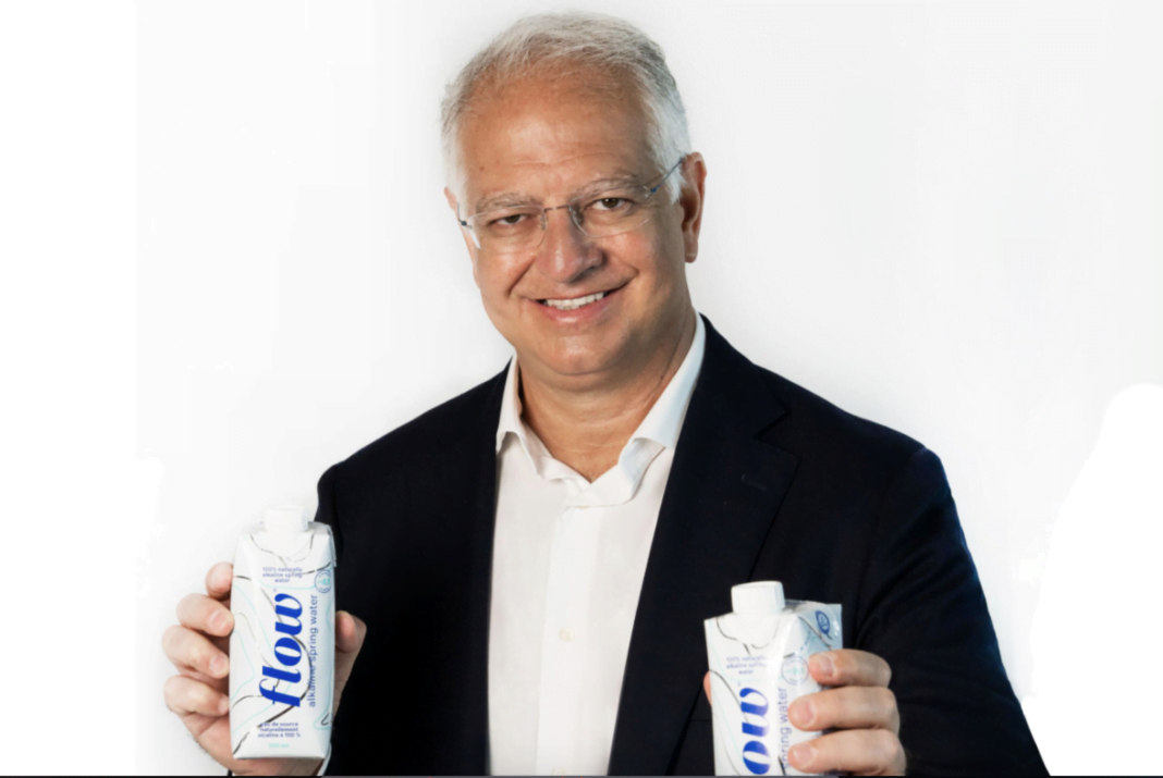 Mr. Maurizio Patarnello holding Flow products