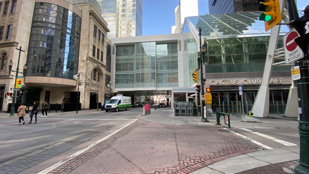Crossing 3rd Street SW from TD Building (left) to the Cactus Club (right) under the 'tunnel' at "The Core" in Calgary