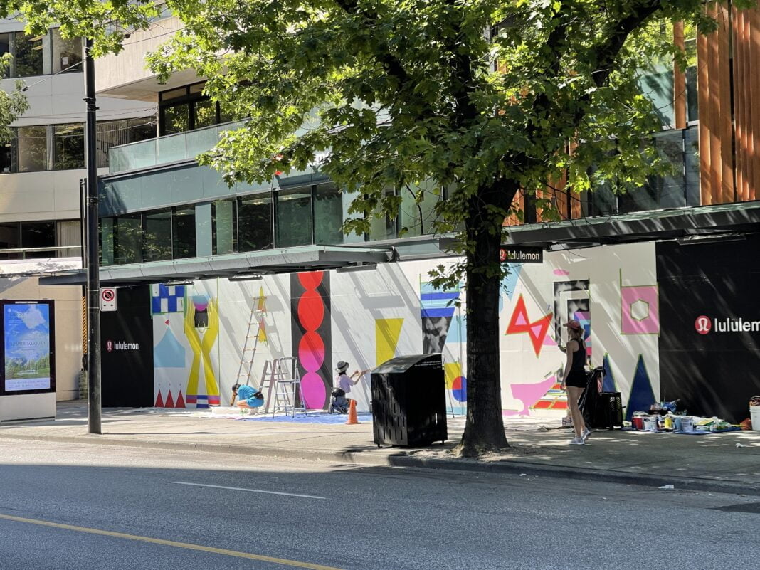 Lululemon signage installed on annexed retail space along Robson Street next to the existing flagship location in downtown Vancouver
