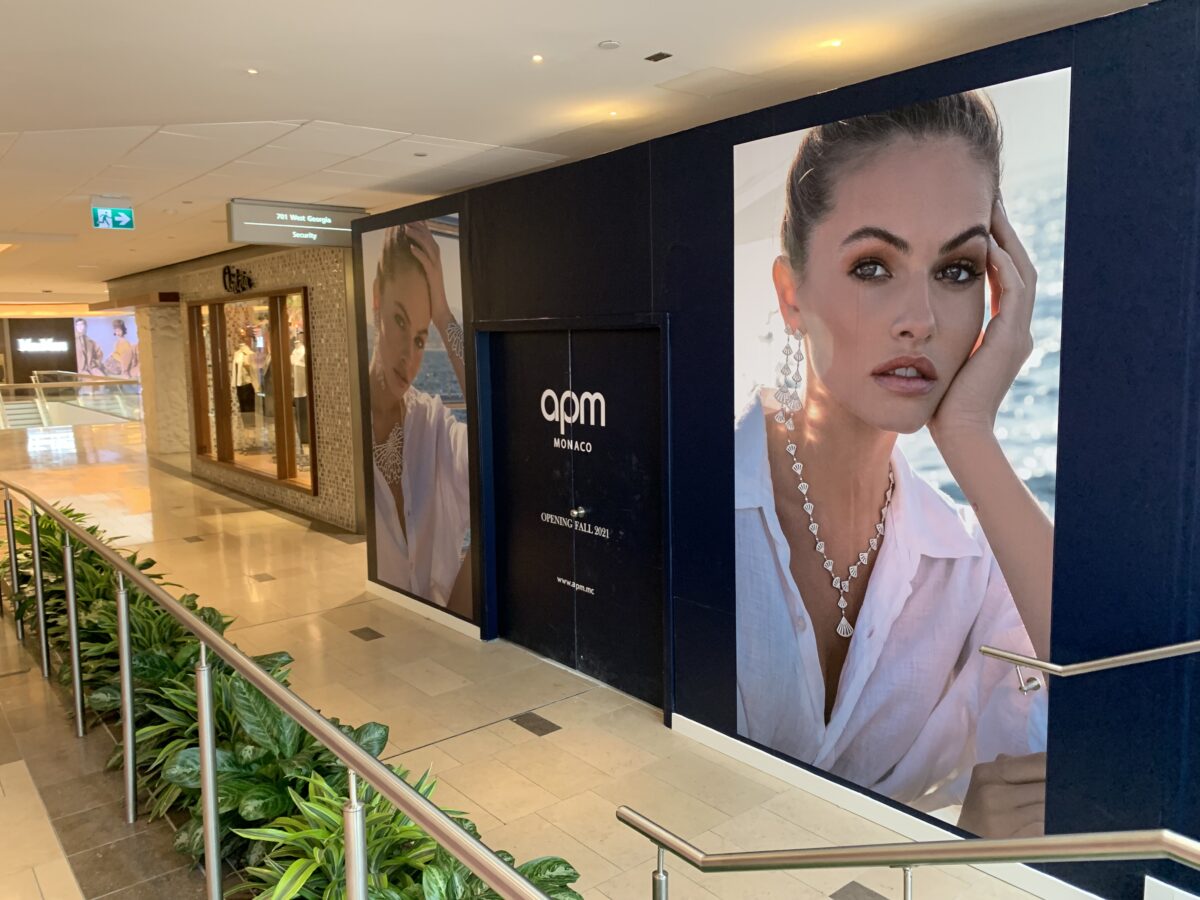 Construction signage for APM Monaco at CF Pacific Centre (October 2021)