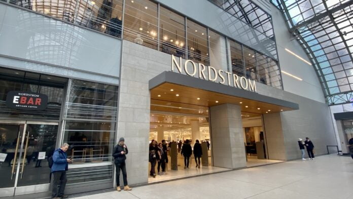 Champagne and shoes: Luxury stores adapt to changing shopper
